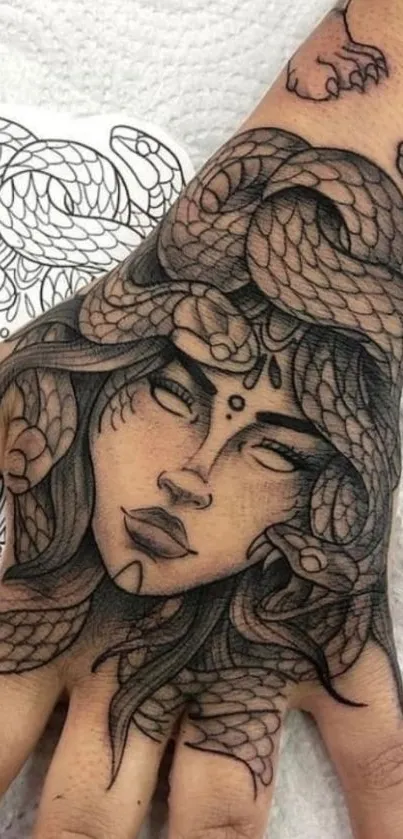 Intricate snake tattoo design on a hand as a mobile wallpaper.