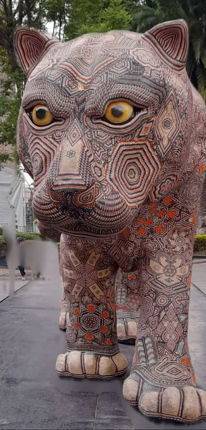 Intricate patterned tiger sculpture on display.