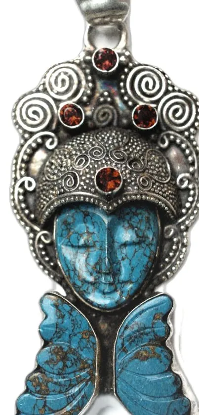 Intricate pendant with turquoise and silver details.