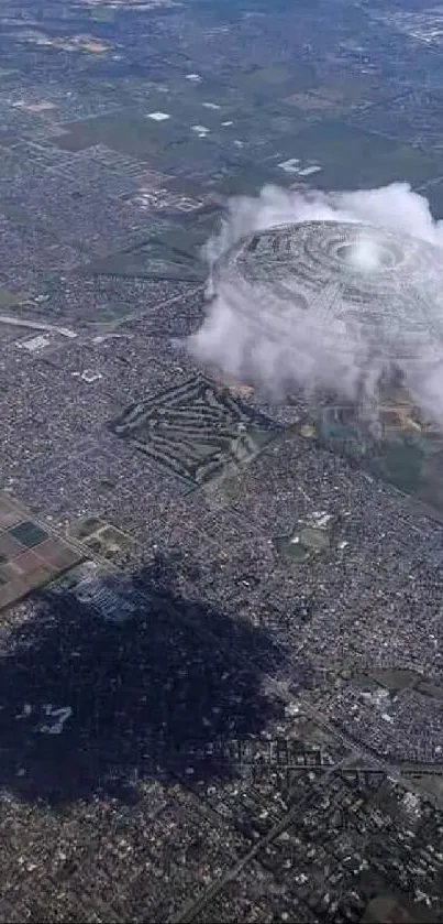 Aerial view of city with unique cloud formation creating a shadow.