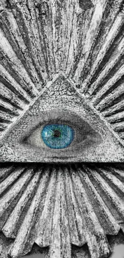 Grayscale wallpaper with a blue eye in a triangle.