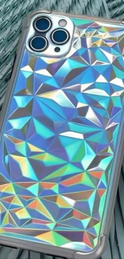 Iridescent geometric phone case on textural background.