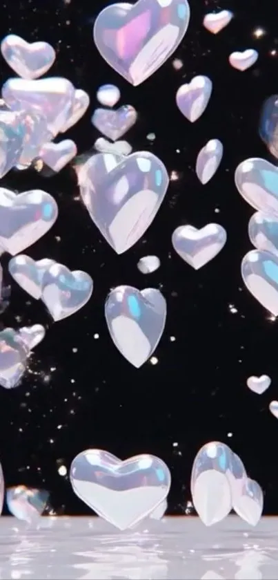 Iridescent 3D hearts on black background wallpaper.