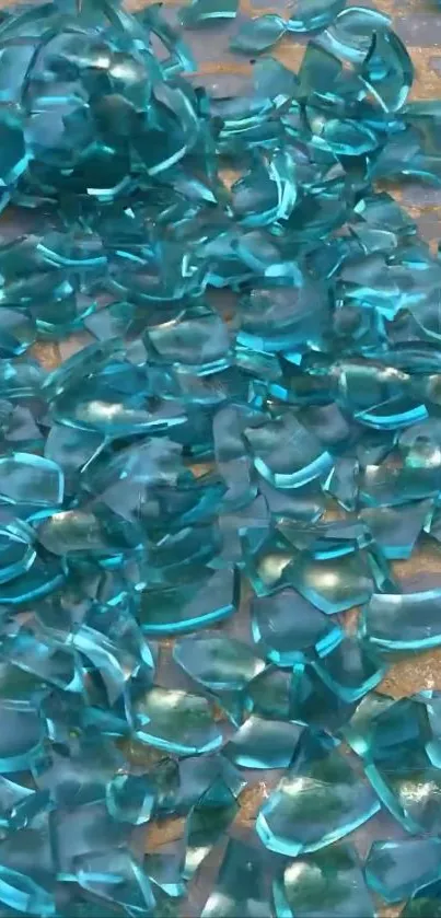 Iridescent shattered glass pieces with a blue hue.