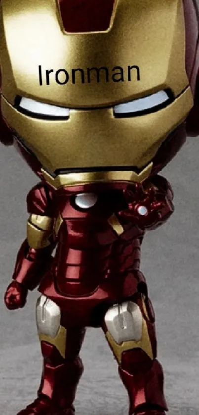 Iron Man action figure with red and gold armor for mobile wallpaper.