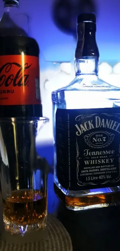 Jack Daniels whiskey and Coca Cola on table.