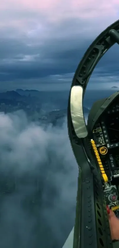 Jet cockpit soaring through cloudy skies with mountainous horizon.