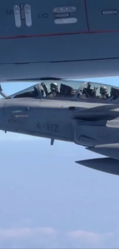 Jet fighter refueling mid-air, cockpit view.