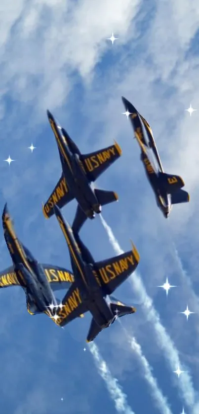 Jets performing a formation in the sky with clouds and blue backdrop.