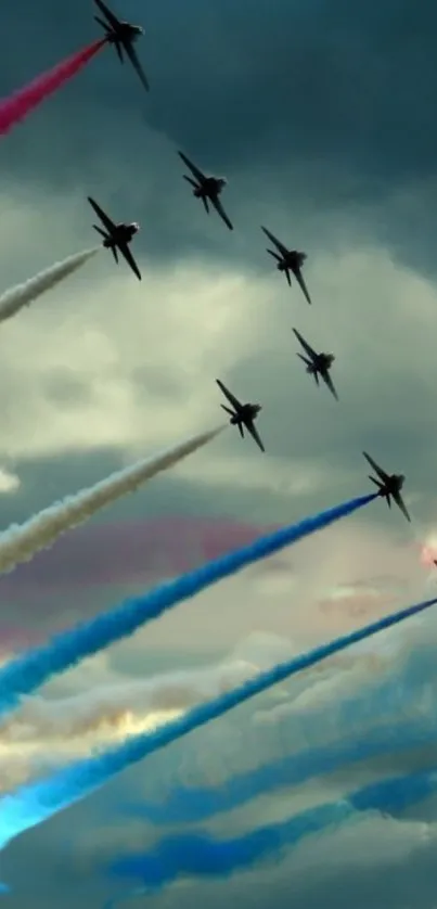 Jets in formation with colorful trails in a cloudy sky wallpaper.