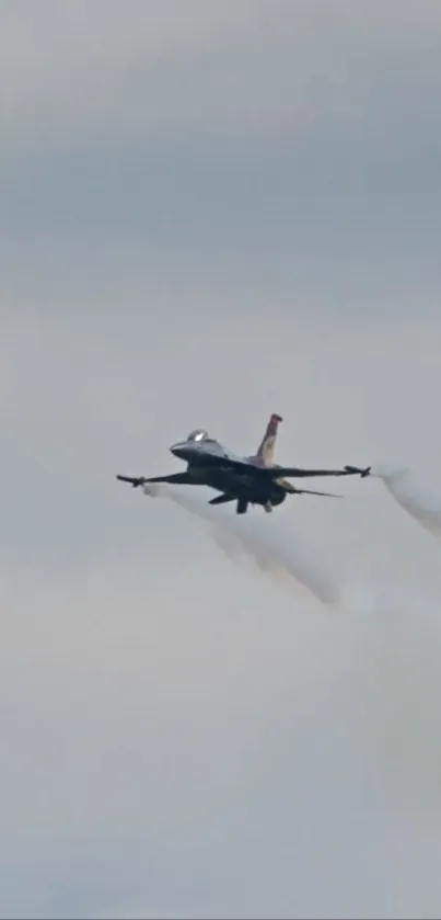 A jet flying through a cloudy sky.