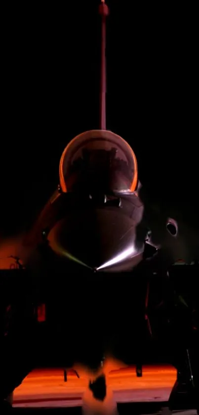 Dark silhouette of a jet on a black background