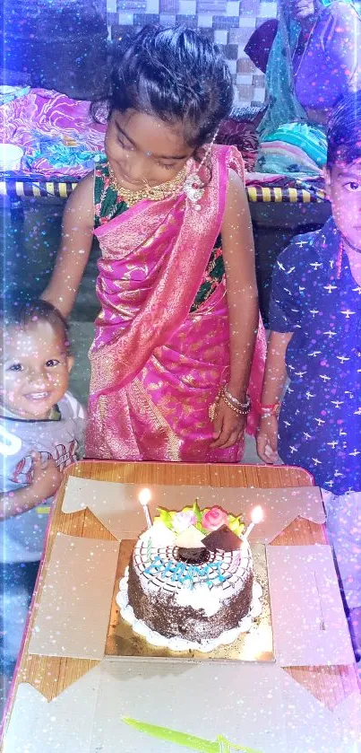 Children celebrating birthday with cake.