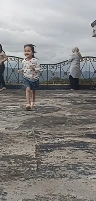 Child joyfully running in scenic outdoor setting.