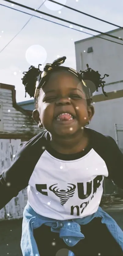 Joyful child with a huge smile outdoors.