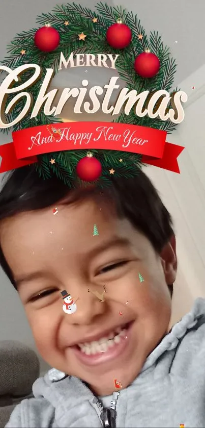 Smiling child with Christmas decorations on a festive mobile wallpaper.