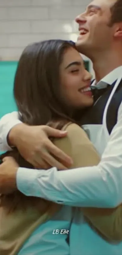 Couple sharing a joyful embrace with smiles.