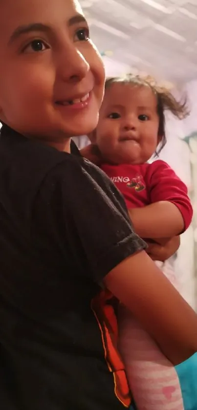 Two smiling children in cozy pastel room.