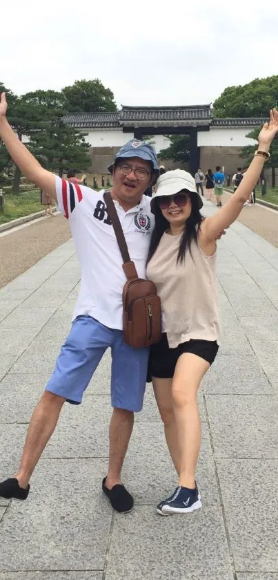 Couple enjoying a joyful outdoor adventure in a scenic location.