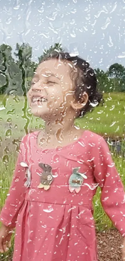 Child smiling joyfully in the rain, with a vibrant natural background.