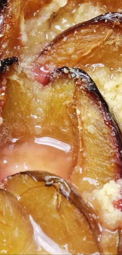 Close-up of a caramelized, juicy baked plum dessert.