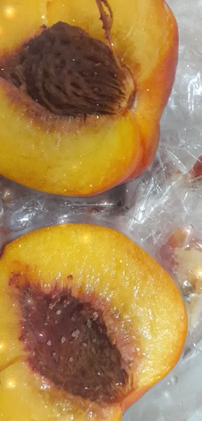 Close-up of juicy peach halves showcasing vibrant amber hues with detailed texture.