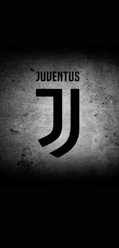 Juventus logo on textured dark background.