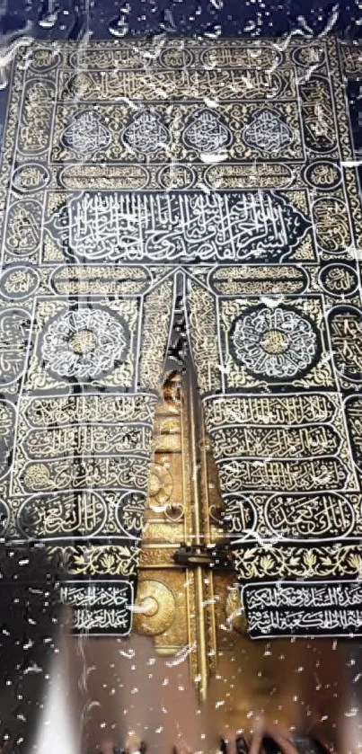 Kaaba door with intricate designs under raindrops, a beautiful Islamic wallpaper.