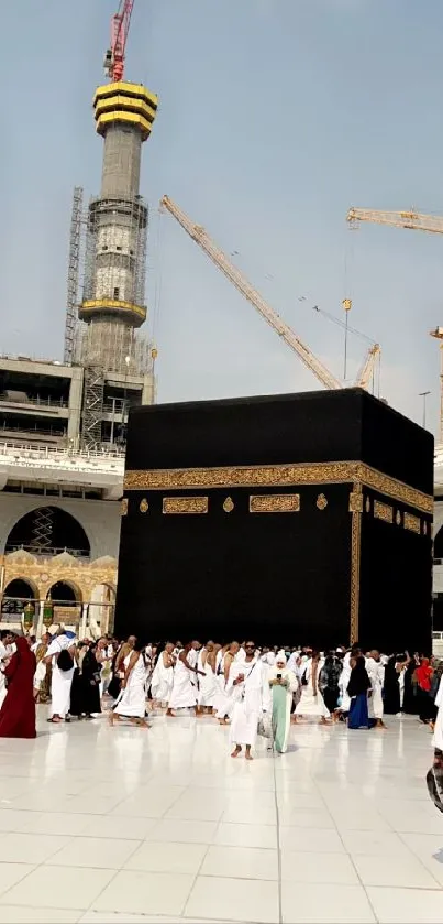 Majestic view of the Kaaba in Mecca surrounded by pilgrims.