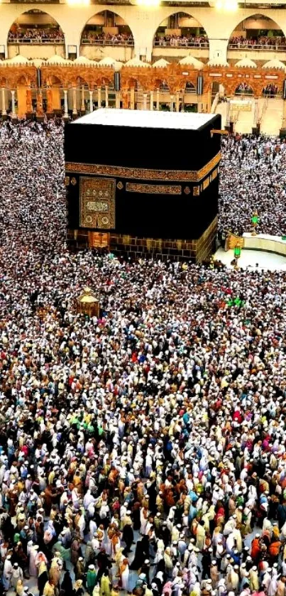 Crowd of pilgrims in Mecca around the Kaaba, a sacred Islamic site.