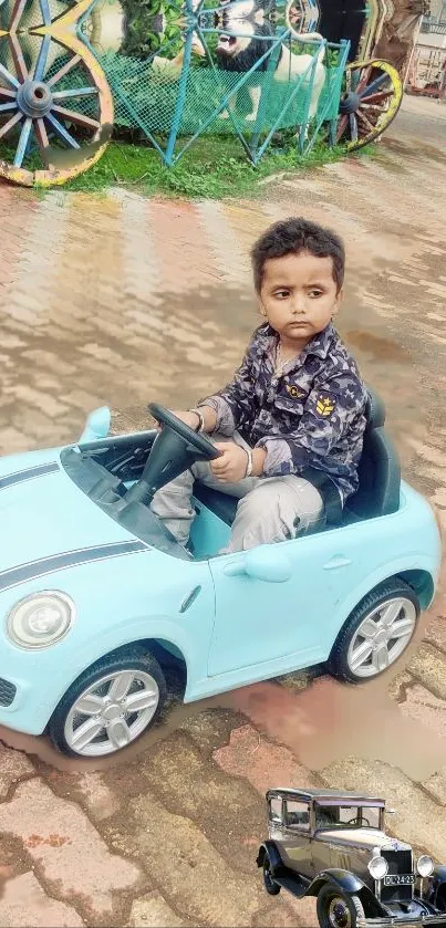 Child enjoying a ride in a blue mini car at the playground.