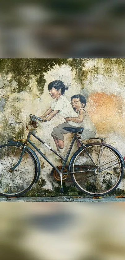 Mural of kids on a bicycle against a textured wall.