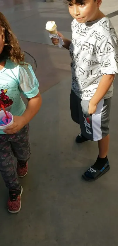 Children enjoying ice cream in vibrant outfits outdoors.