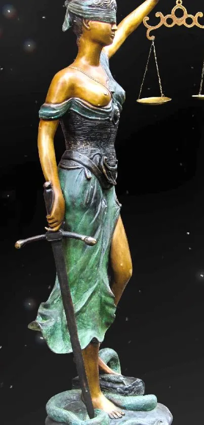 Lady Justice statue holding scales with sword on dark background.