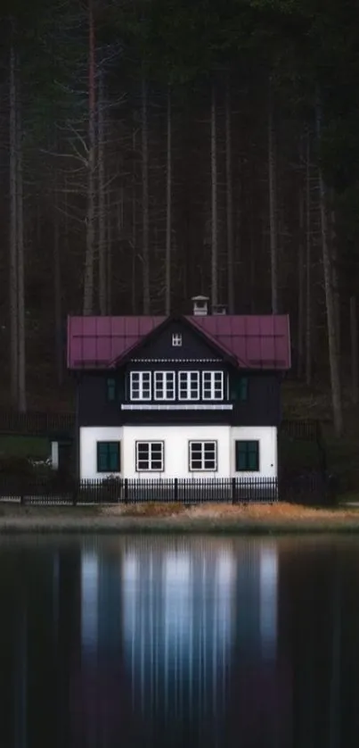 Lakeside house with forest background reflecting on calm water.