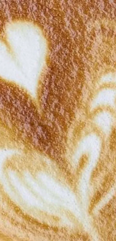 Latte art with heart design in creamy coffee foam.