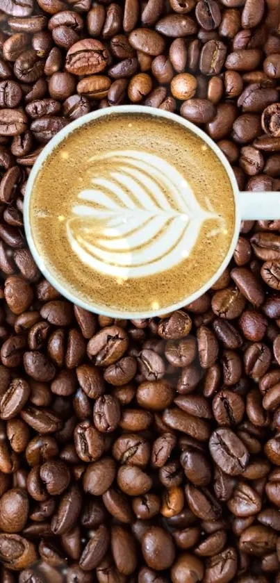 Coffee cup with latte art on coffee beans background.