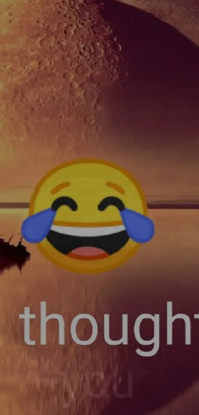 Laughing emoji with a sunset and large planet in the background.