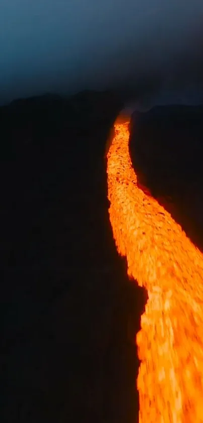 Vibrant lava flowing through a dark volcanic landscape.