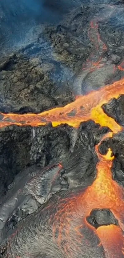 Vibrant lava flowing over rugged rocks with vivid orange tones.