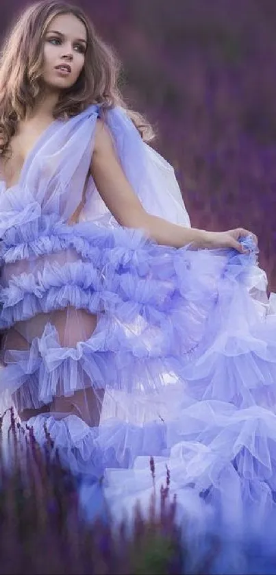 Woman in lavender dress in a dreamy field setting.