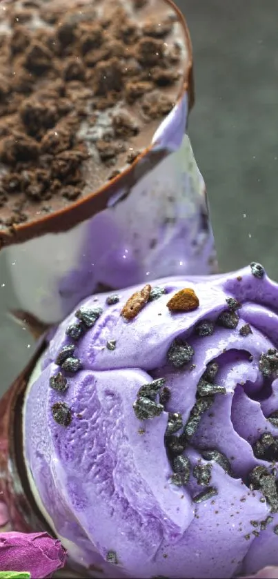 Lavender ice cream cone with chocolate topping against a textured background.