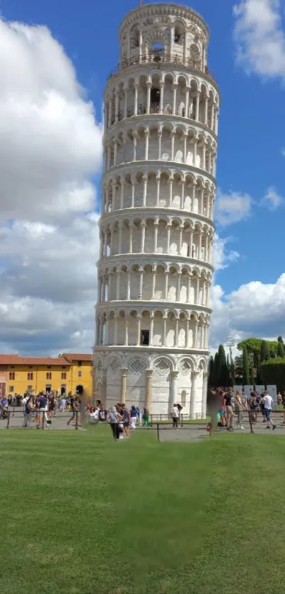 Iconic Leaning Tower of Pisa under a blue sky.