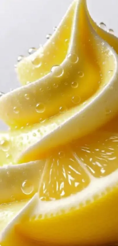 Close-up of lemon swirl with droplets in vibrant yellow tones.