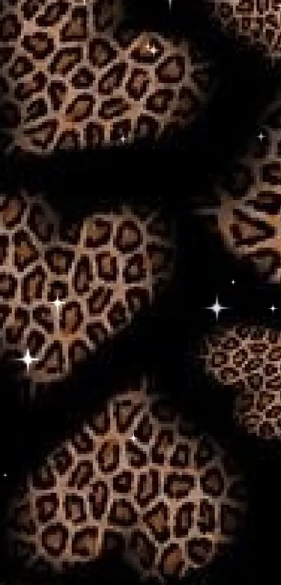 Leopard print hearts on a black background wallpaper.