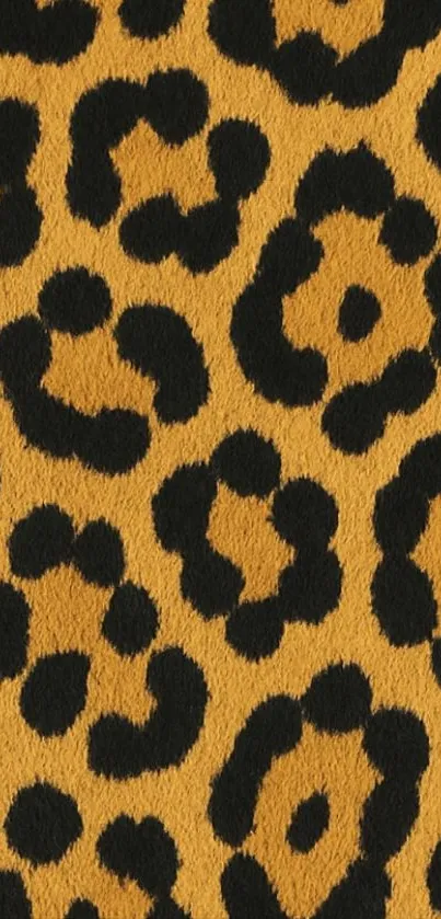 Leopard print mobile wallpaper with black spots on golden yellow background.