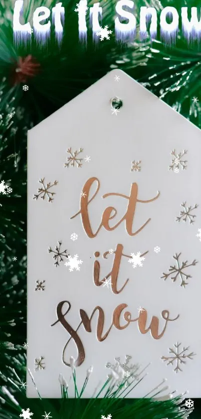 Festive 'Let It Snow' wallpaper with snowflakes and green background.