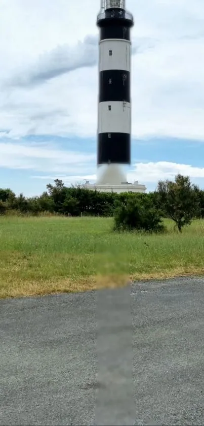 Lighthouse with green grass and blue sky mobile wallpaper.