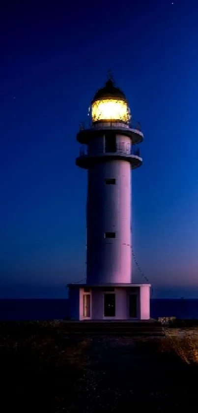 Lighthouse under a vibrant dusk sky with pink and blue hues.