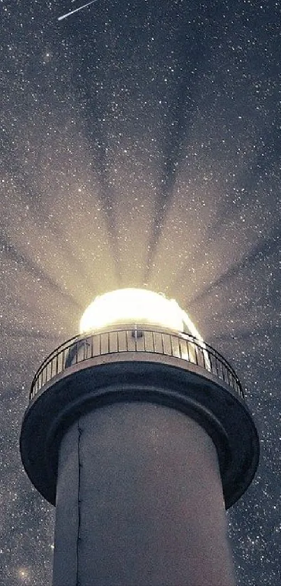 Lighthouse illuminated against a starry sky.